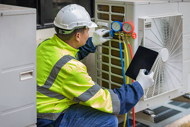 Professional Ductwork Repair technician working in Yukon, MO
